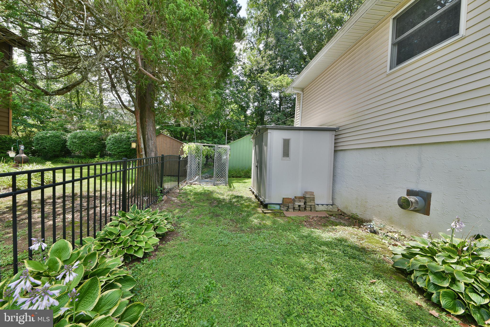 1035 Old Ford Road Huntingdon Valley, PA 19006 - Photo 37 of 39 a backyard of a house with lots of green space