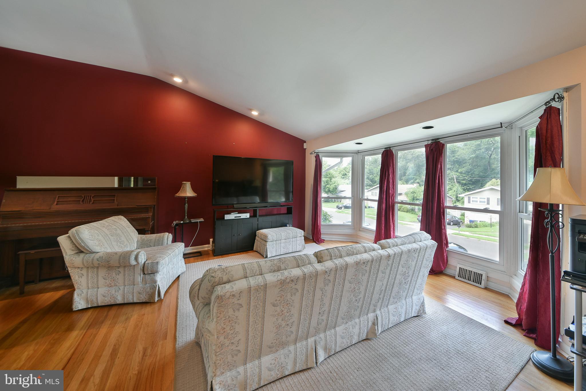 1035 Old Ford Road Huntingdon Valley, PA 19006 - Photo 5 of 39 a living room with furniture and a flat screen tv