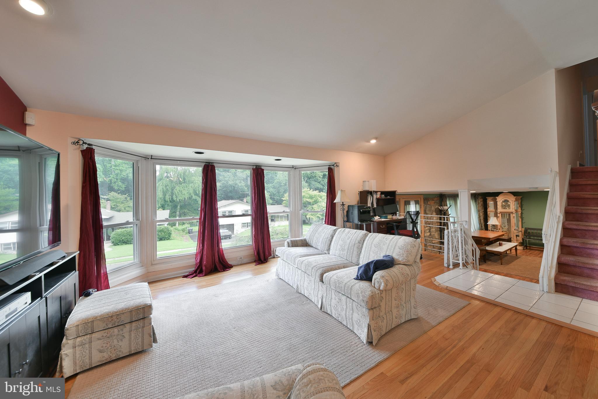 1035 Old Ford Road Huntingdon Valley, PA 19006 - Photo 6 of 39 a living room with furniture and a flat screen tv