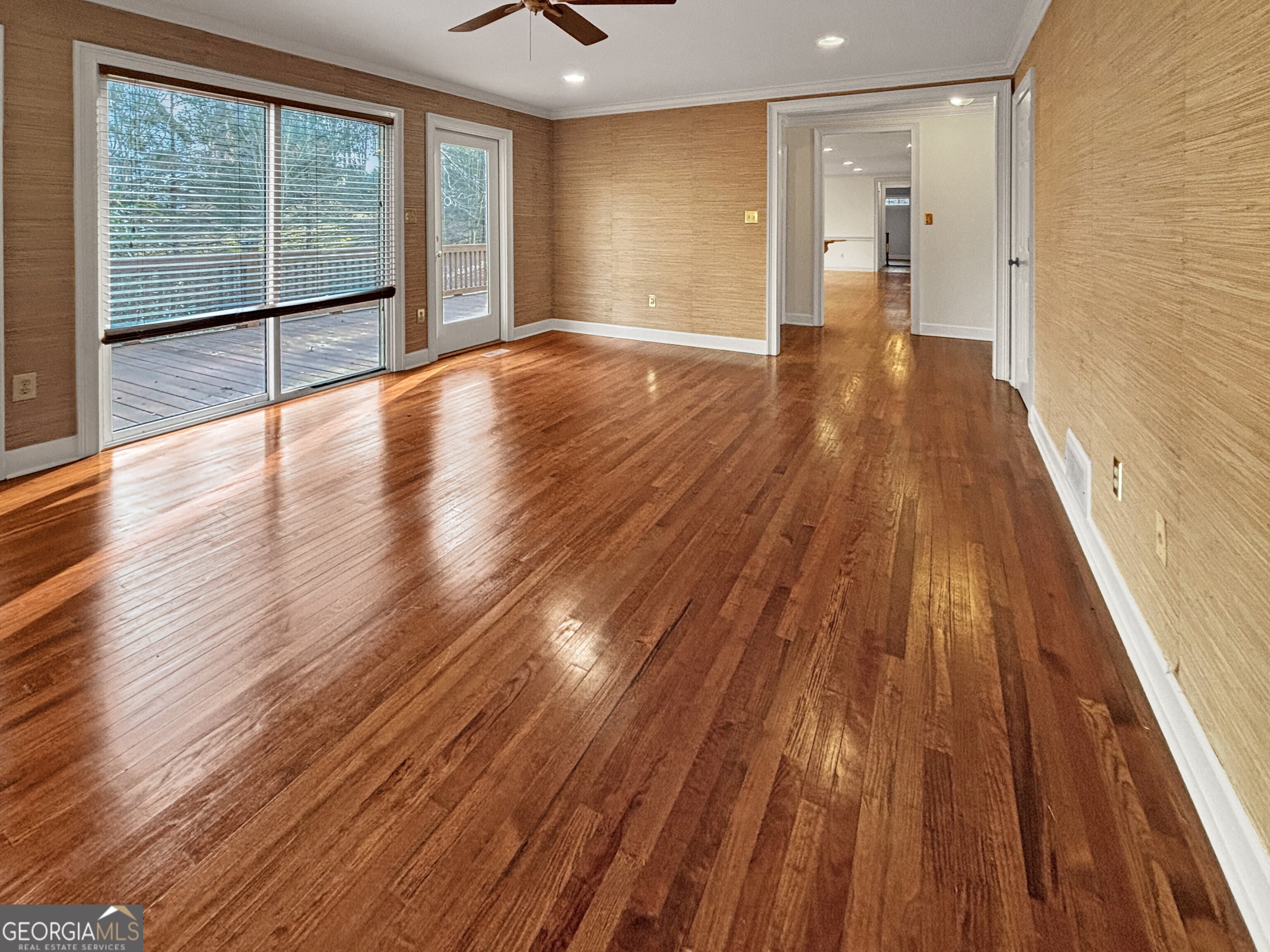 125 Mitchell Bluff Athens, GA 30606 - Photo 12 of 55 a view of an empty room with wooden floor and a window