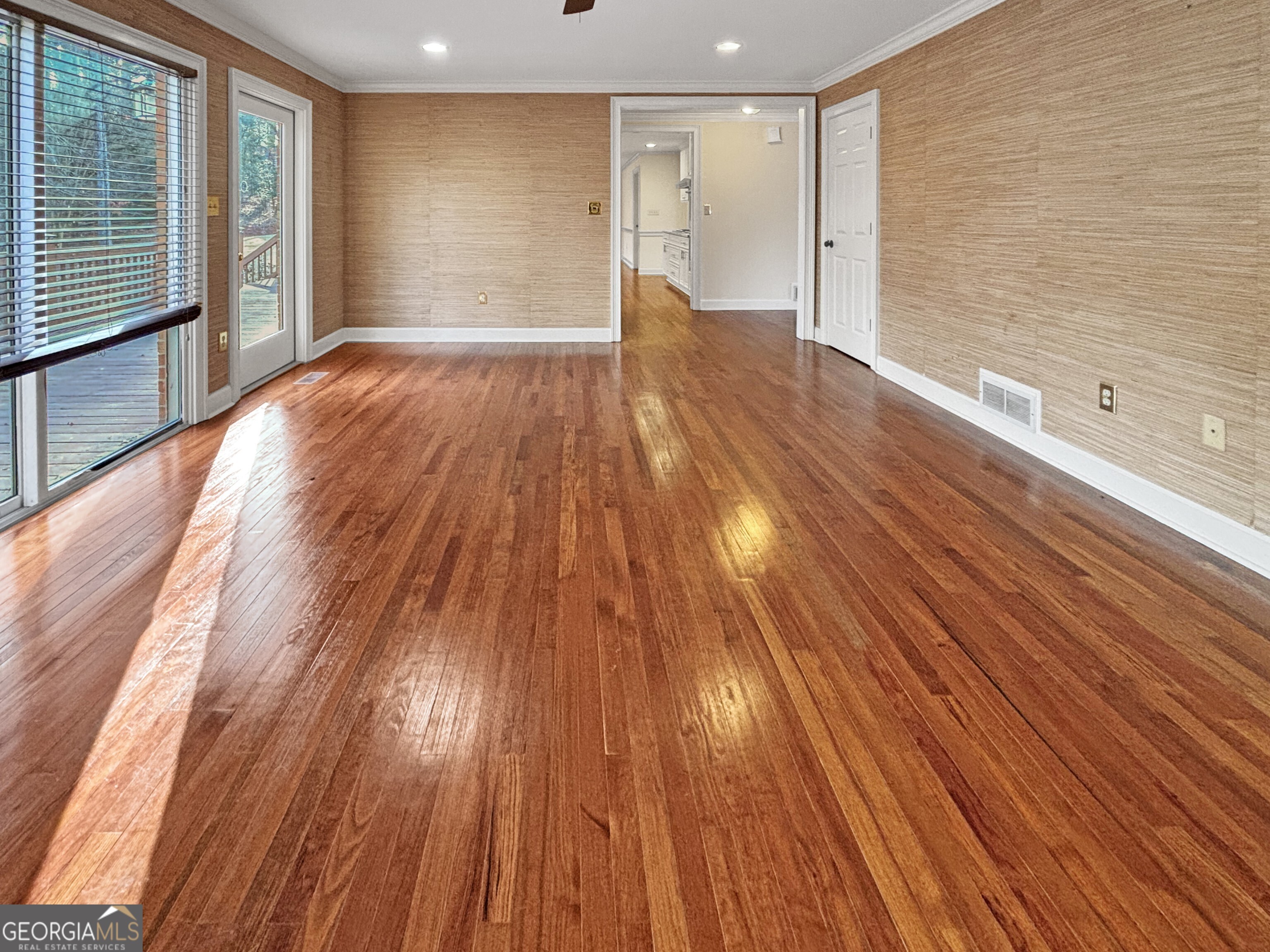 125 Mitchell Bluff Athens, GA 30606 - Photo 13 of 55 a view of empty room with wooden floor and fan