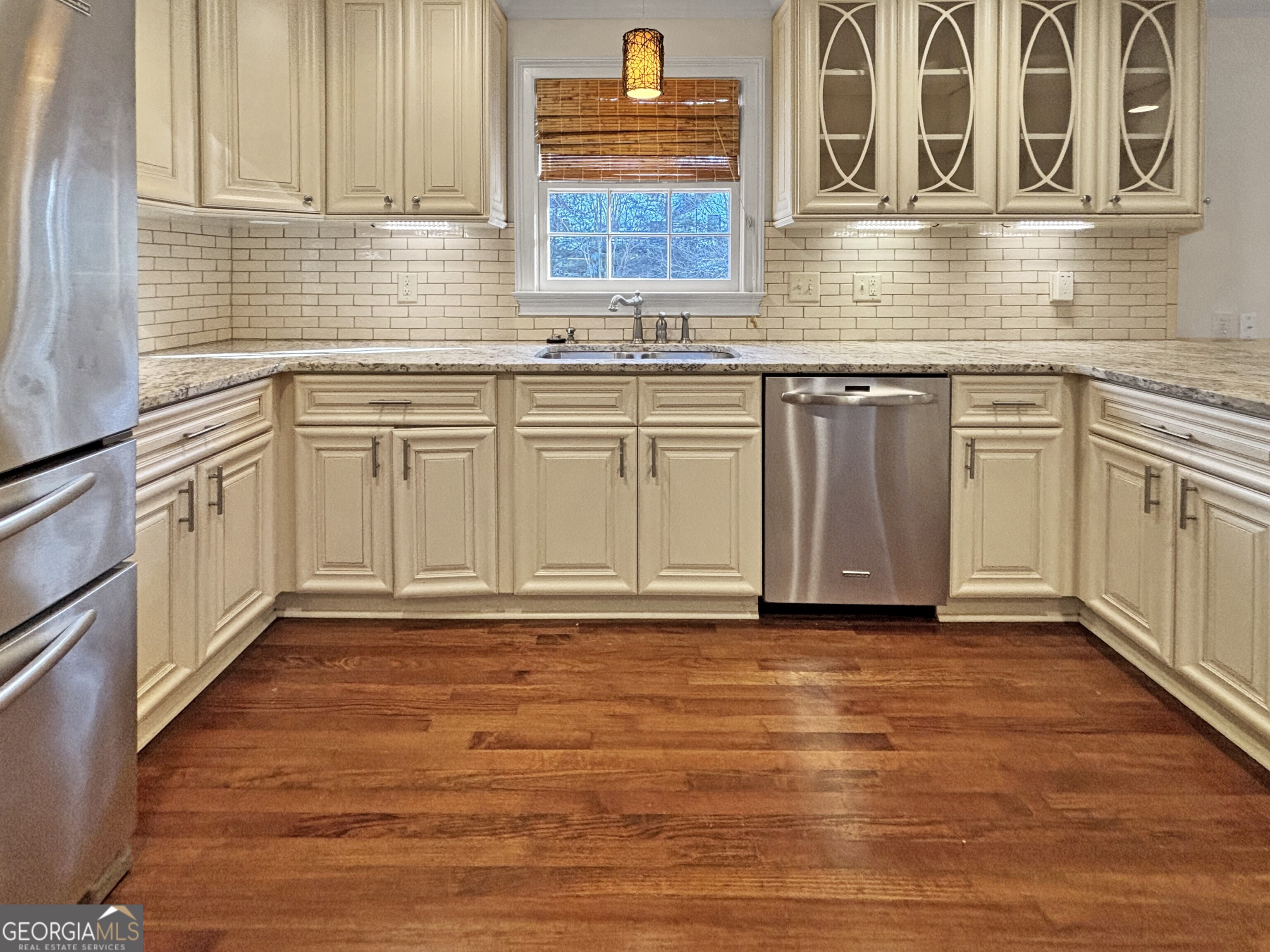 125 Mitchell Bluff Athens, GA 30606 - Photo 16 of 55 a kitchen with stainless steel appliances granite countertop a sink and a stove