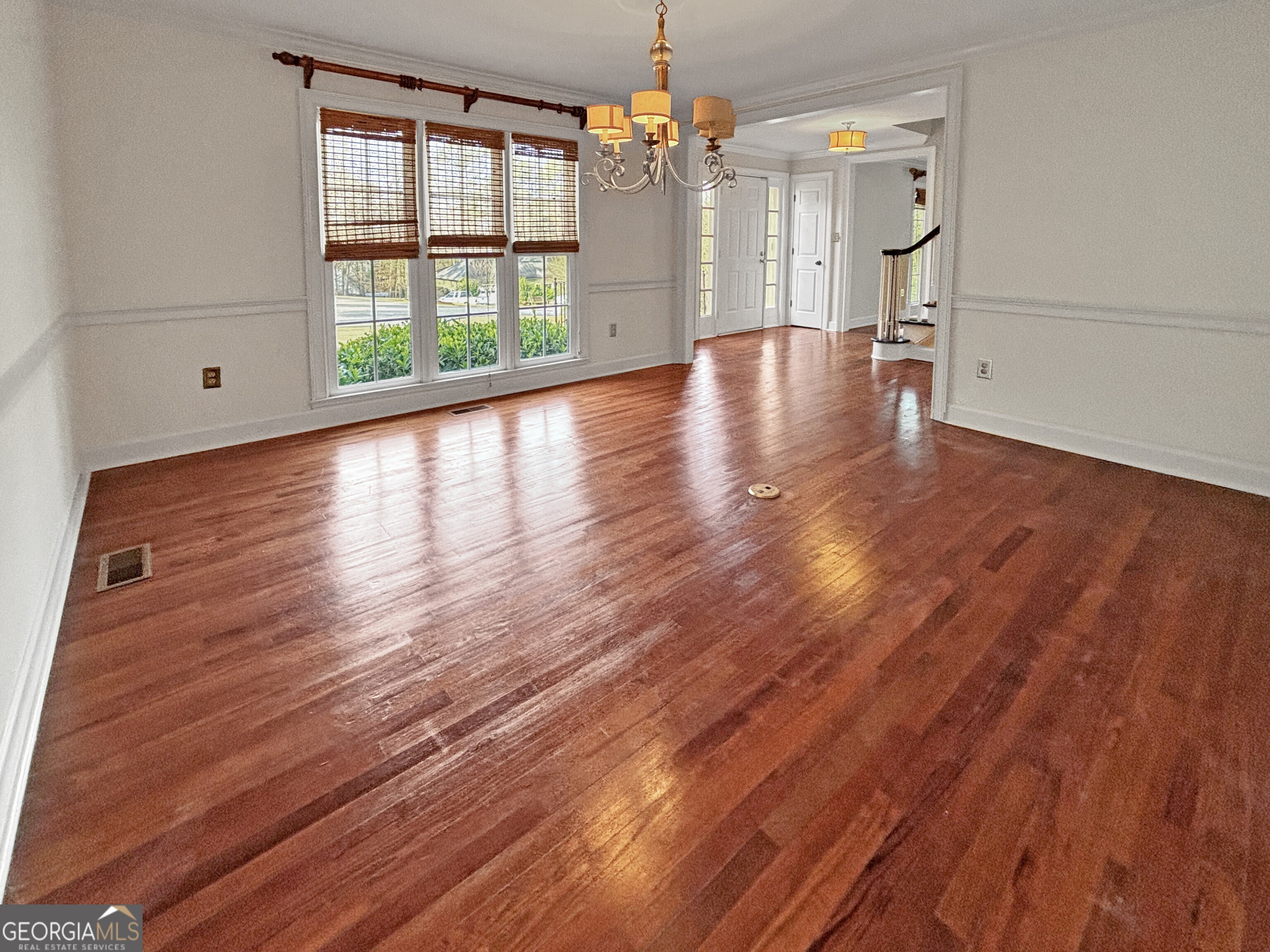 125 Mitchell Bluff Athens, GA 30606 - Photo 23 of 55 a view of a room with wooden floor and a floor to ceiling window