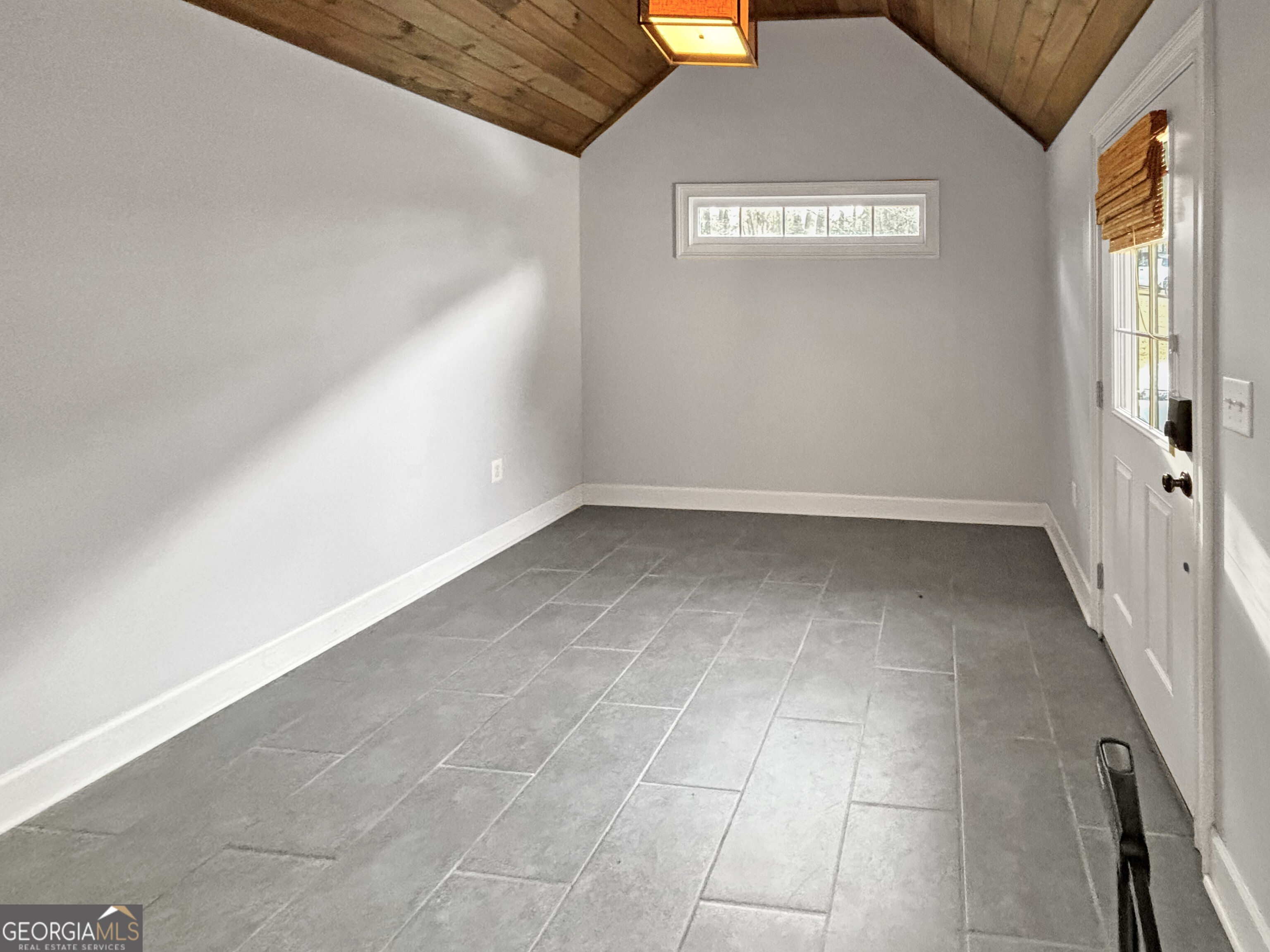 125 Mitchell Bluff Athens, GA 30606 - Photo 27 of 55 a view of an empty room with a window