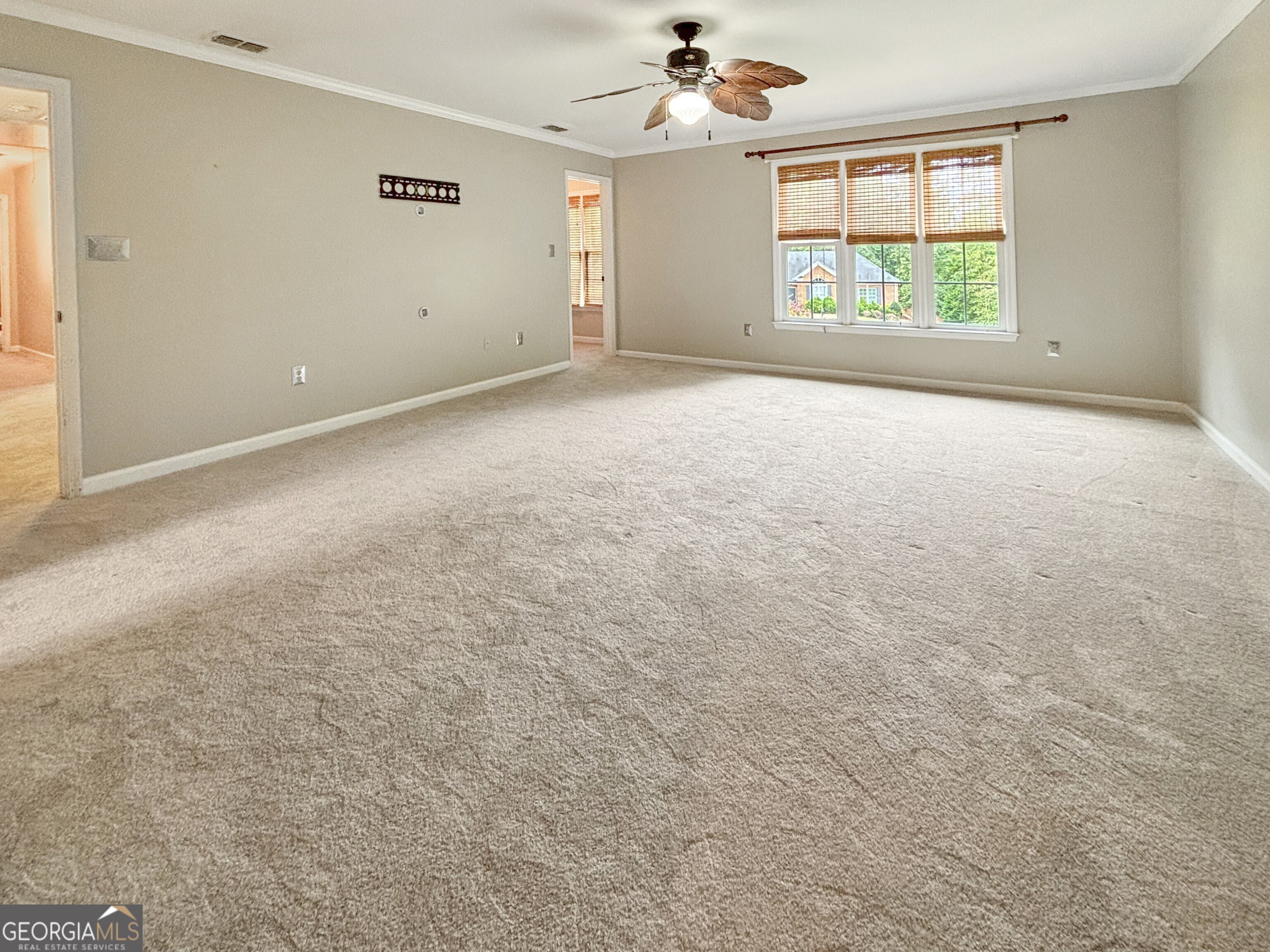 125 Mitchell Bluff Athens, GA 30606 - Photo 33 of 55 an empty room with windows and chandelier fan
