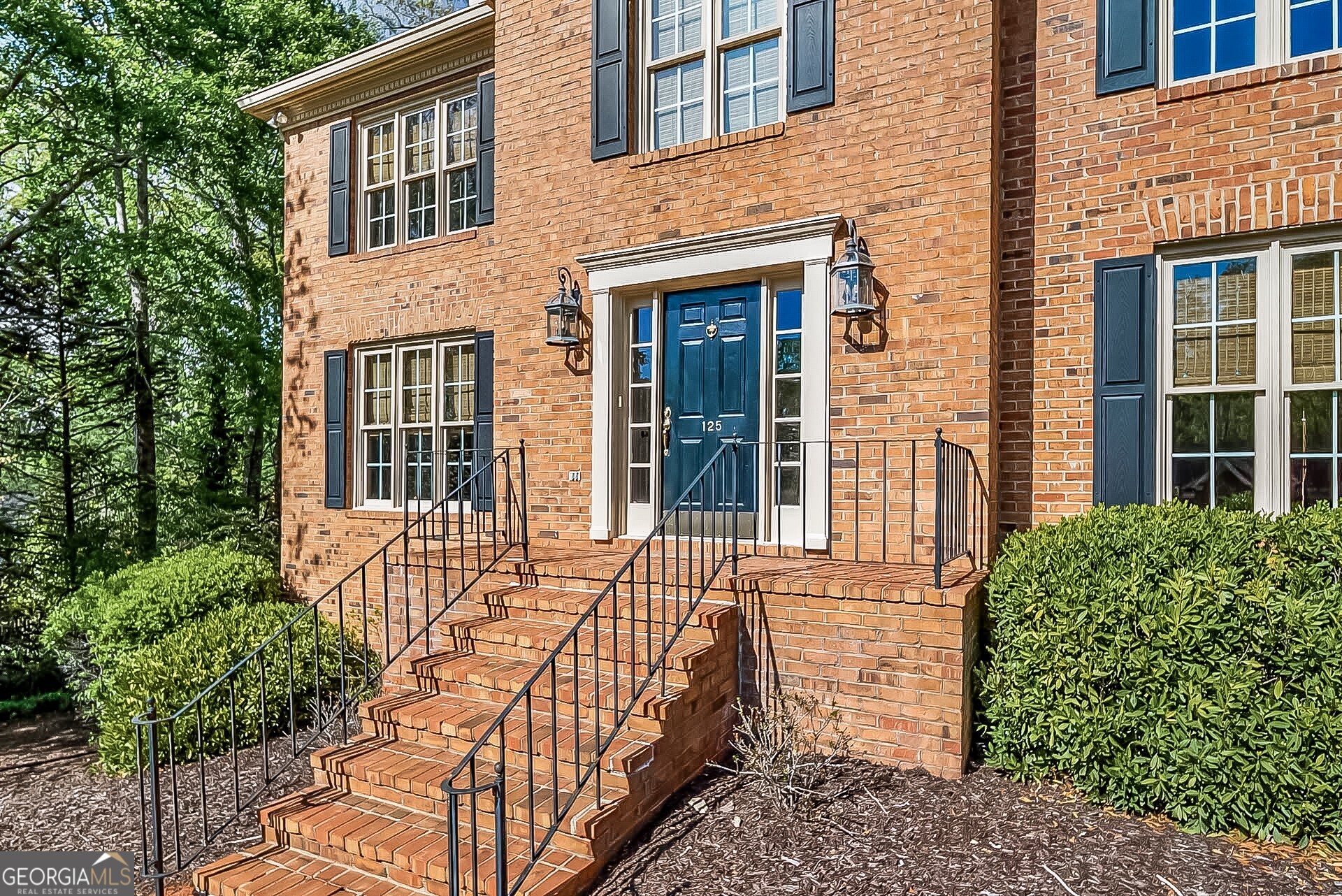 125 Mitchell Bluff Athens, GA 30606 - Photo 4 of 55 front view of a brick house with a large window