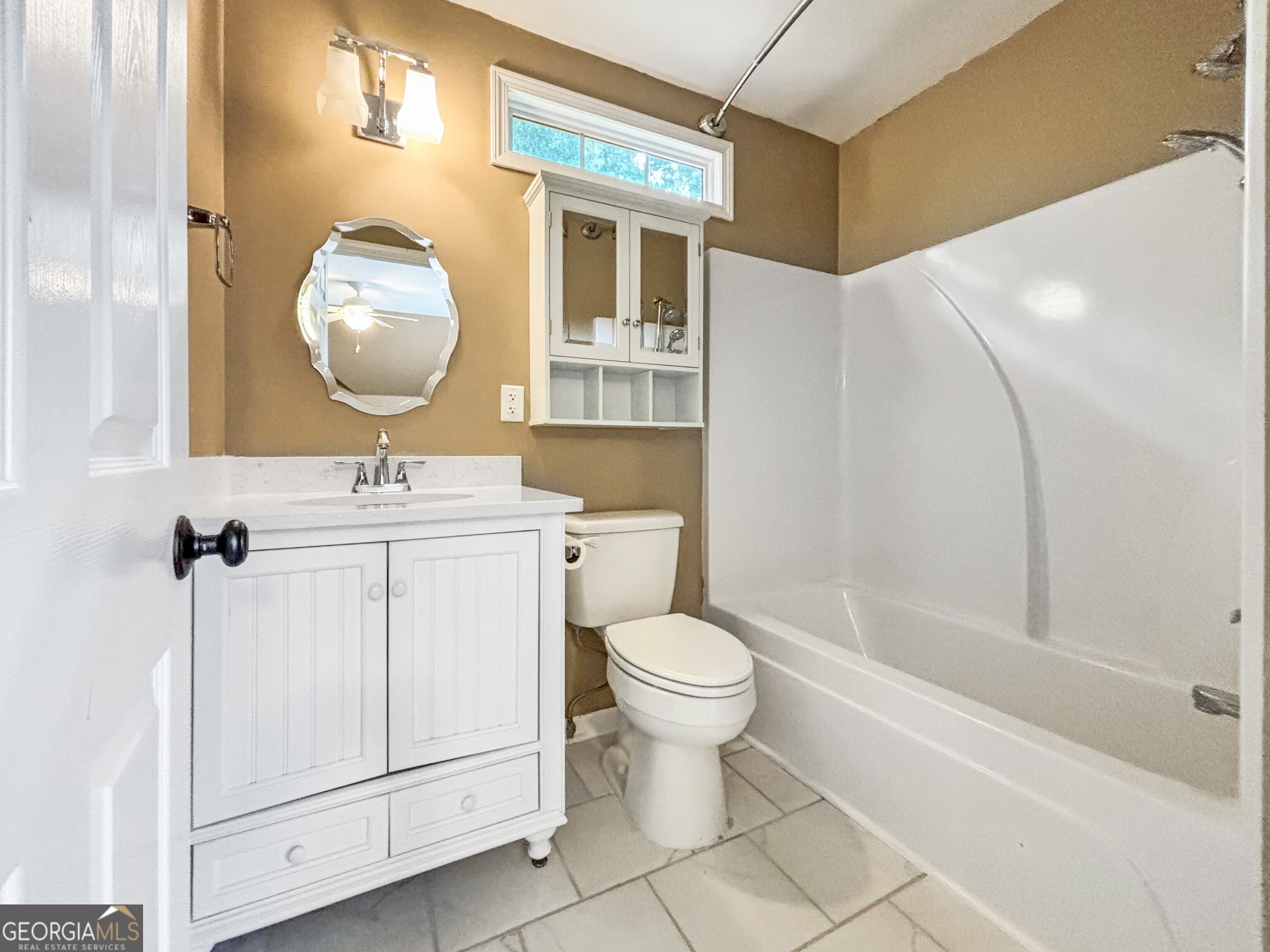 125 Mitchell Bluff Athens, GA 30606 - Photo 42 of 55 a bathroom with a sink a toilet and bathtub