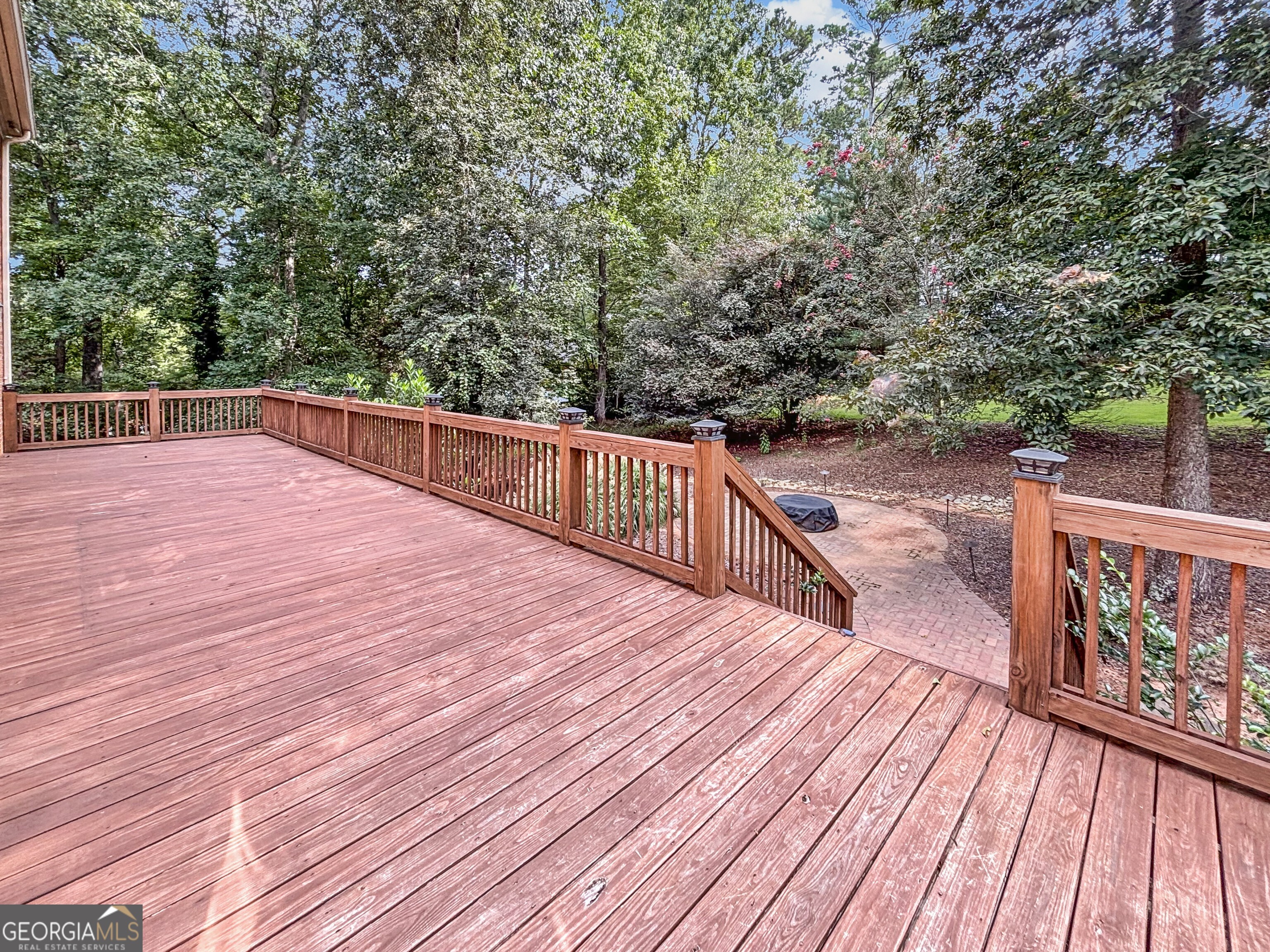 125 Mitchell Bluff Athens, GA 30606 - Photo 45 of 55 a balcony with wooden floor and trees