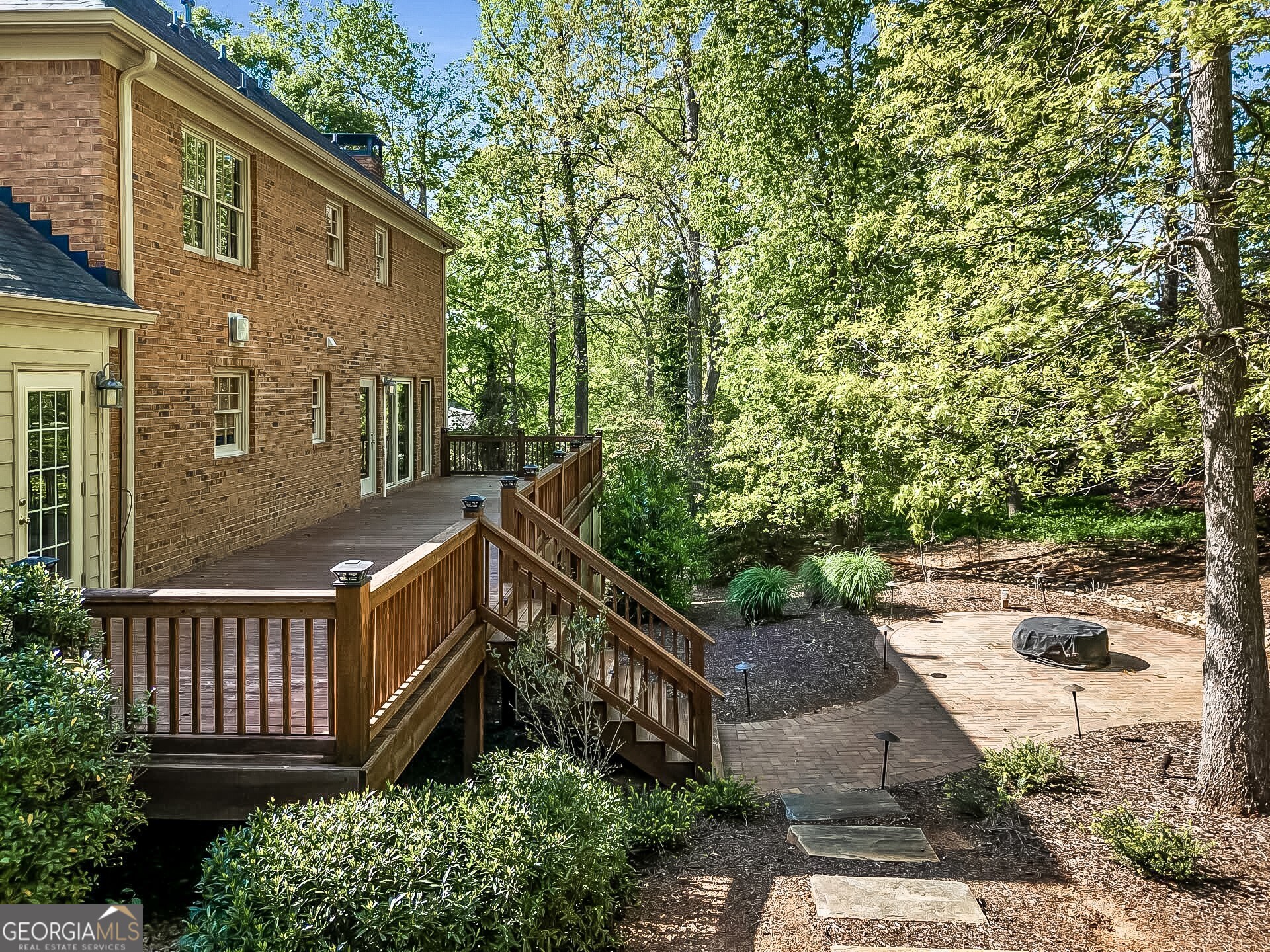 125 Mitchell Bluff Athens, GA 30606 - Photo 51 of 55 a view of a house with a small yard and wooden fence