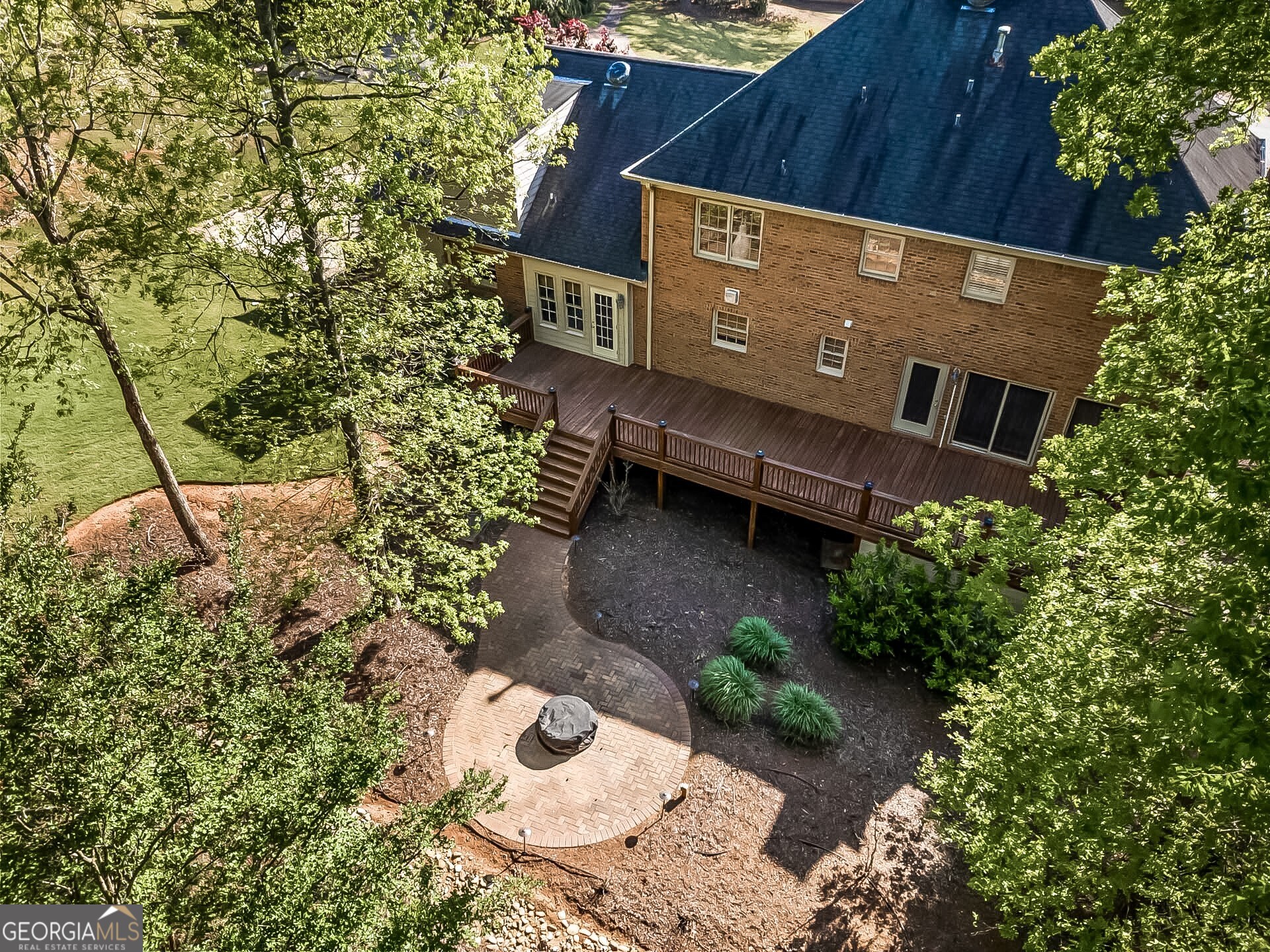 125 Mitchell Bluff Athens, GA 30606 - Photo 53 of 55 a view of a wooden house with a yard and sitting area