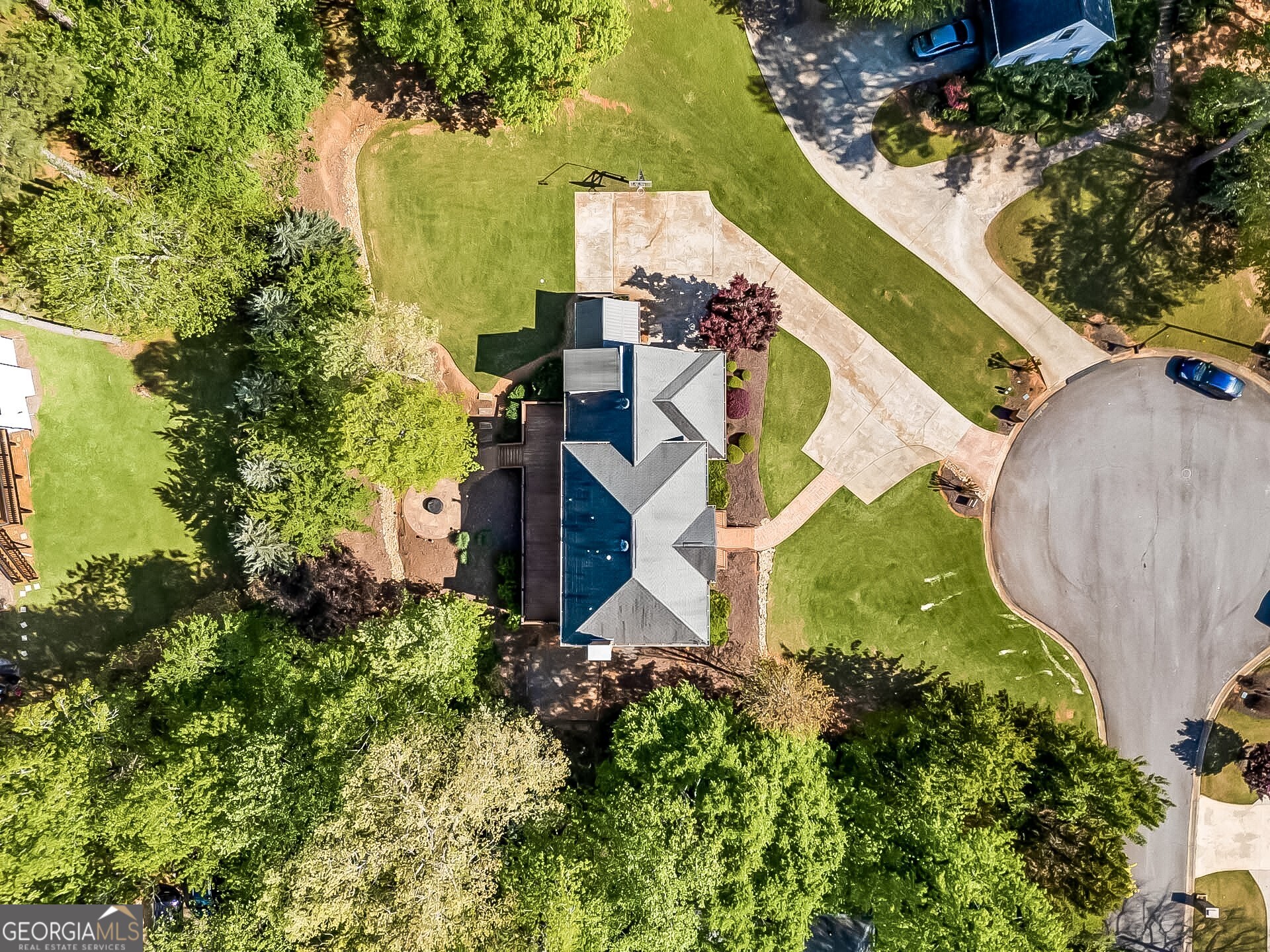 125 Mitchell Bluff Athens, GA 30606 - Photo 55 of 55 an aerial view of a house with a yard and trees
