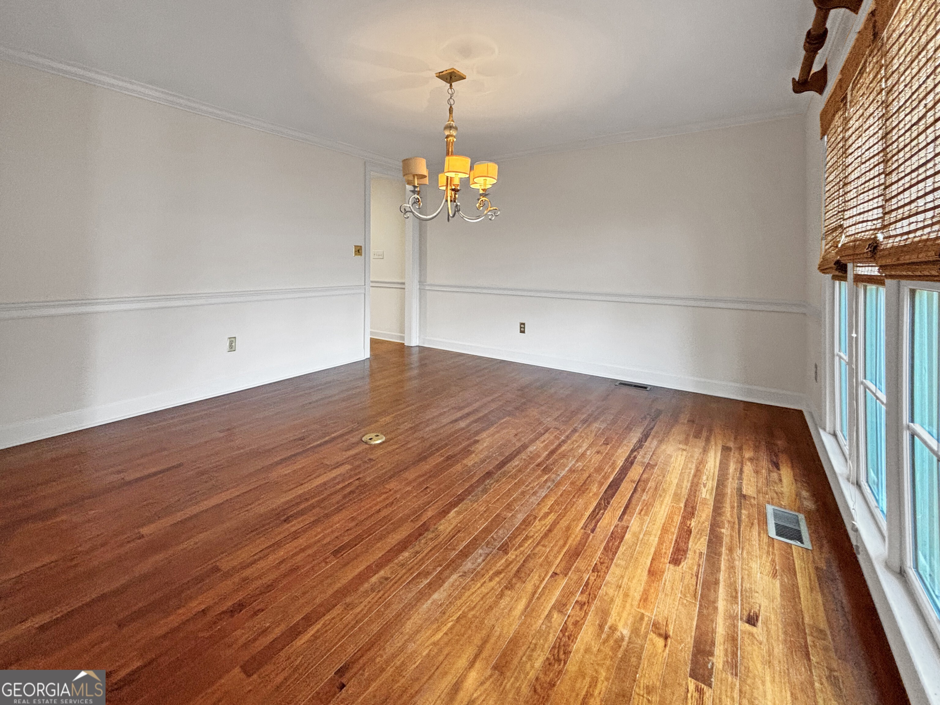 125 Mitchell Bluff Athens, GA 30606 - Photo 7 of 55 an empty room with wooden floor and windows