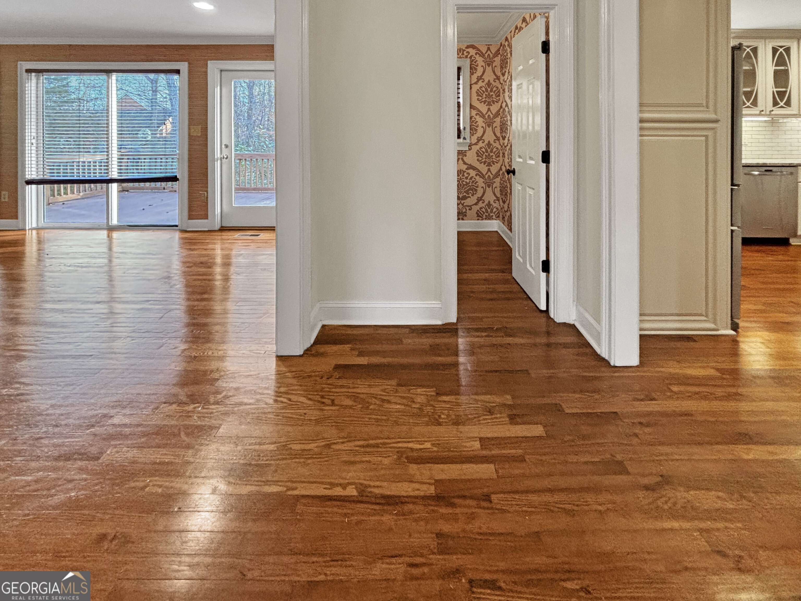 125 Mitchell Bluff Athens, GA 30606 - Photo 10 of 55 a view of a hallway with wooden floor and staircase