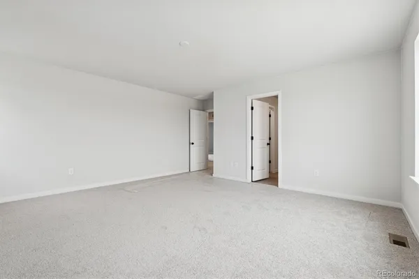 an empty room with a natural light