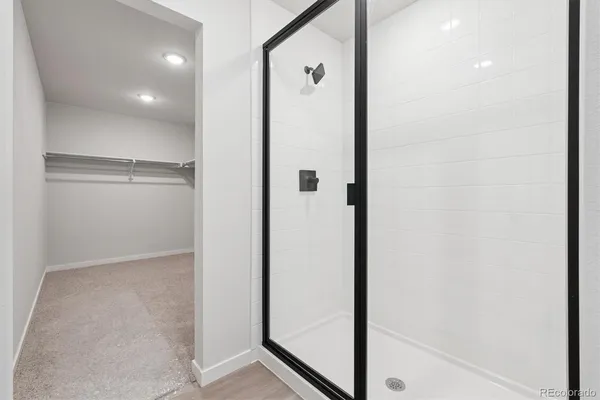 a view of a hallway with closet