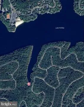 a view of a yard with an ocean