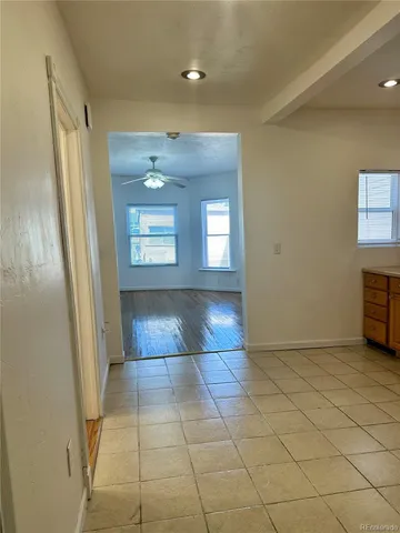 a view of an empty room and window