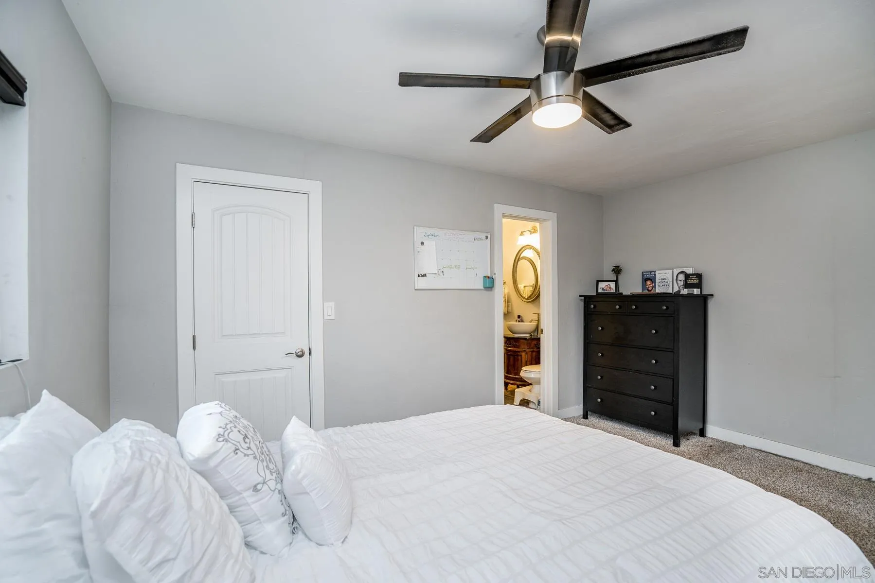 9206 Lamar Street Spring Valley, CA 91977 - Photo 11 of 21 a bedroom with a bed and a closet