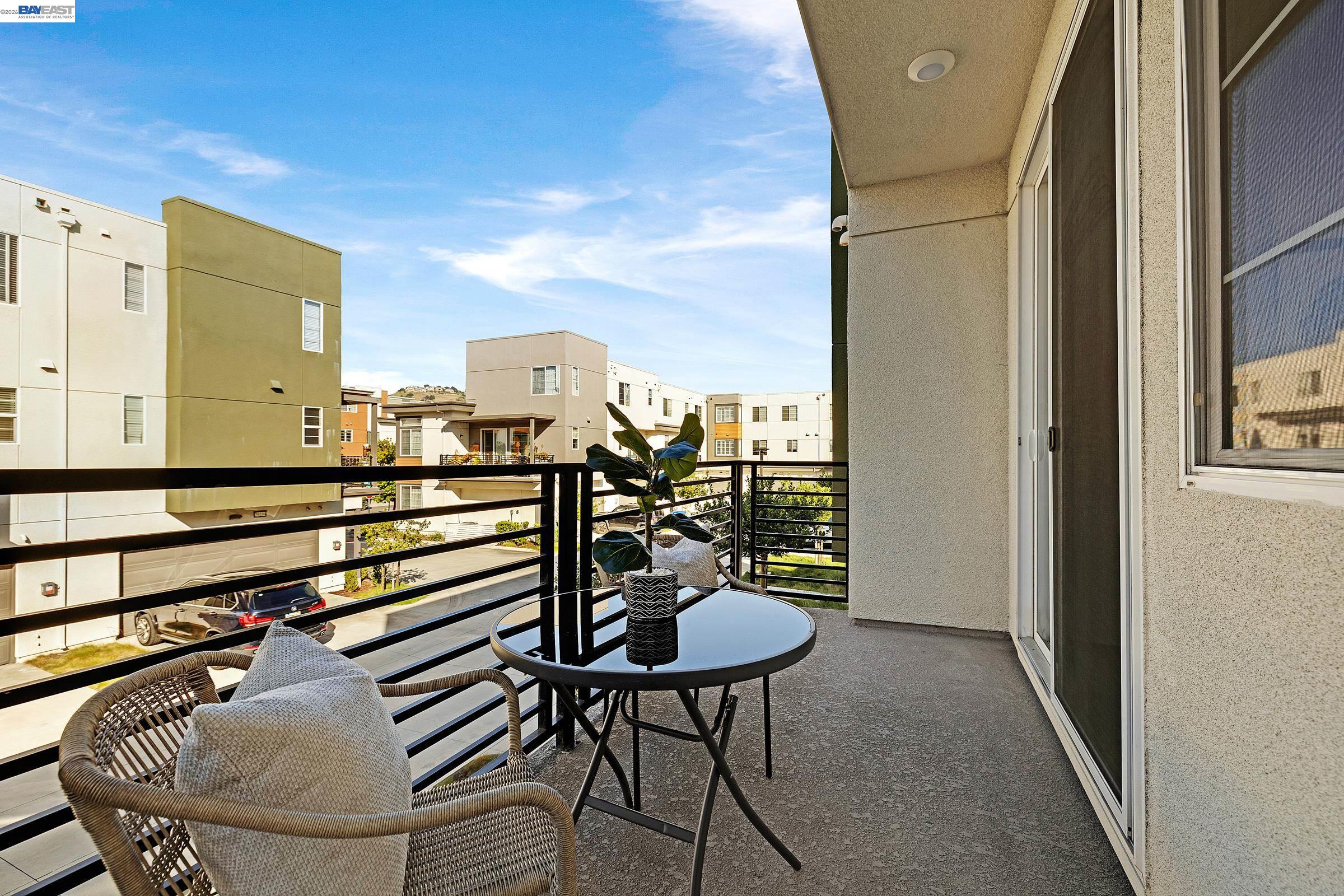 29259 Hub Court Hayward, CA 94544 - Photo 11 of 34 a view of a balcony dining table and chairs
