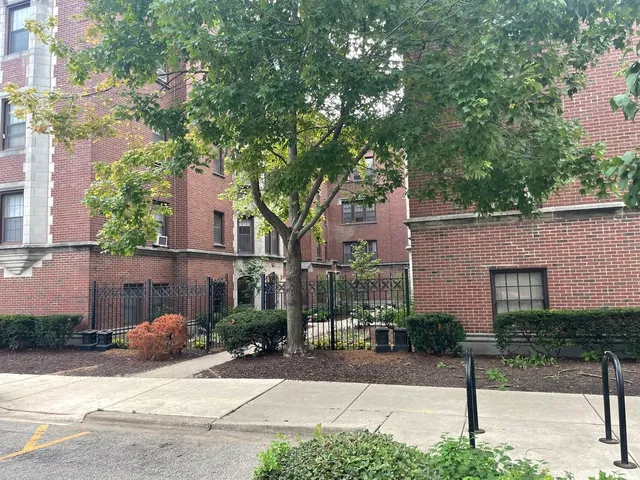 front view of a house with a street