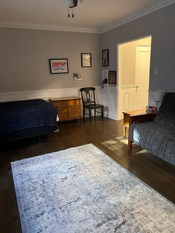 a living room with furniture and a couch