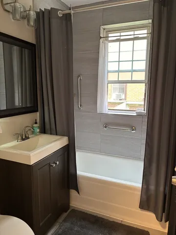 a bathroom with a sink and a bathtub