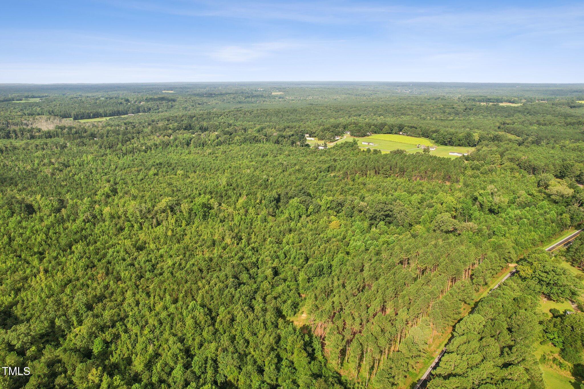 0 Mcleod Broadway, NC 27505 - Photo 6 of 11 a view of a field with an ocean
