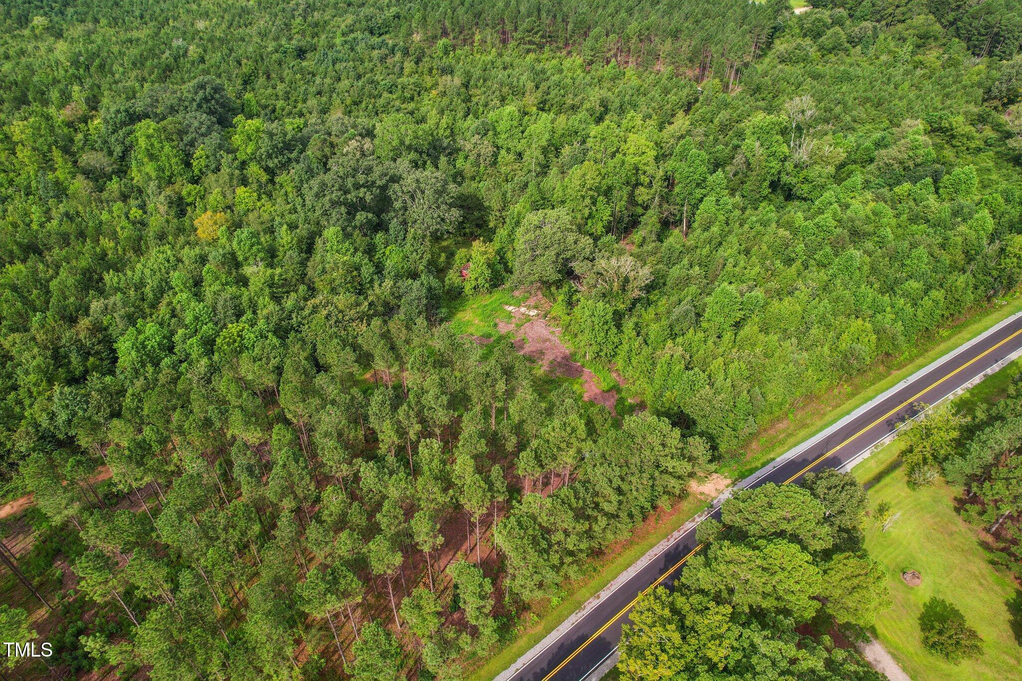 0 Mcleod Broadway, NC 27505 - Photo 10 of 11 a view of a garden from a balcony