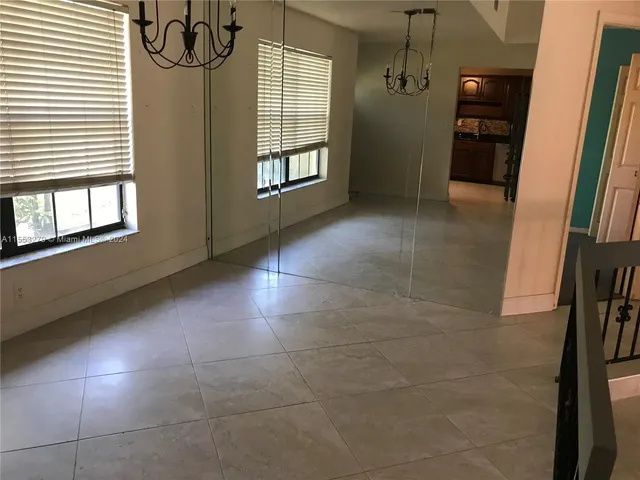 a view of a livingroom with a window