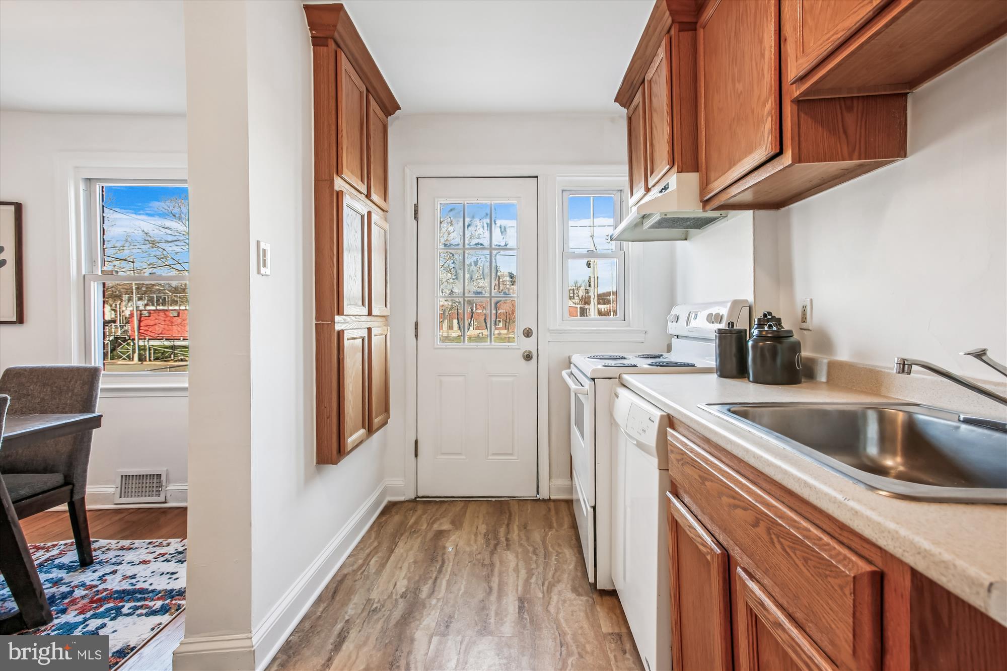 1760 E Street Northeast Washington, DC 20002 - Photo 12 of 46 a kitchen with a sink and cabinets