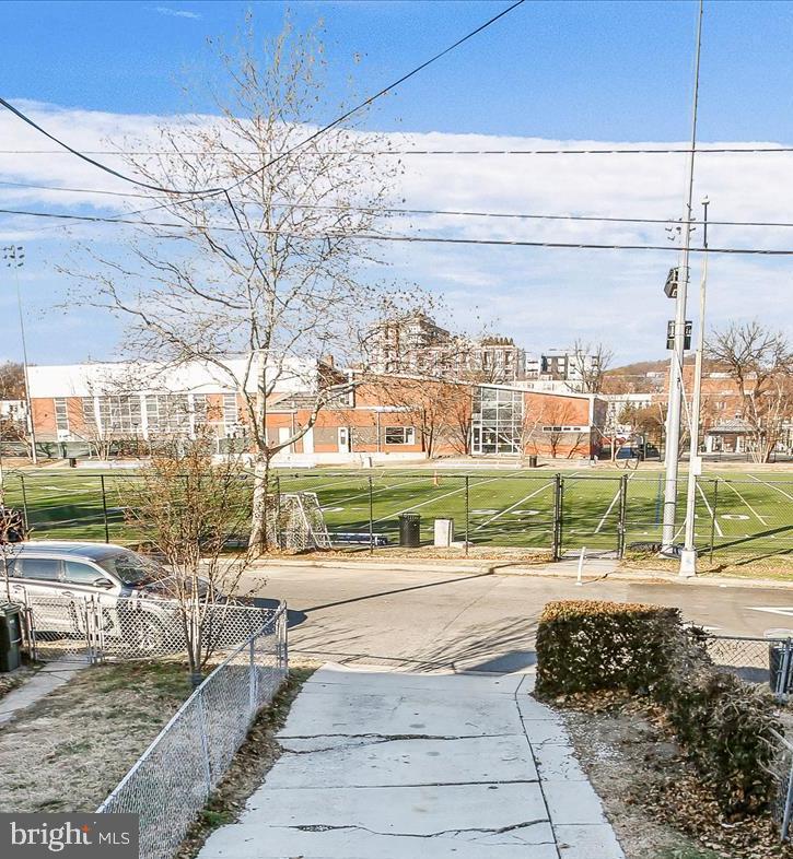 1760 E Street Northeast Washington, DC 20002 - Photo 34 of 46 a view of a tall building with a yard