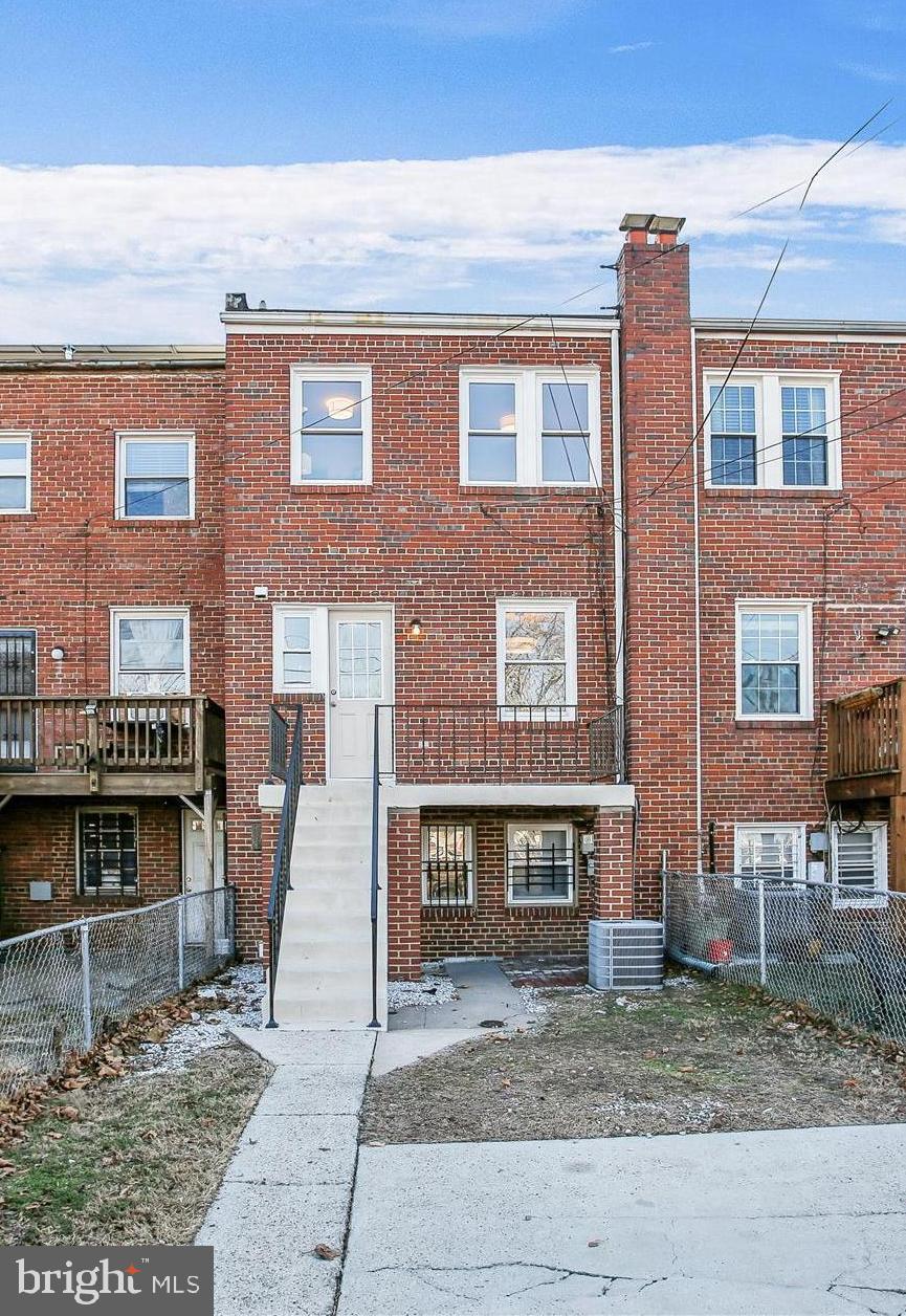 1760 E Street Northeast Washington, DC 20002 - Photo 35 of 46 a front view of a building with glass windows