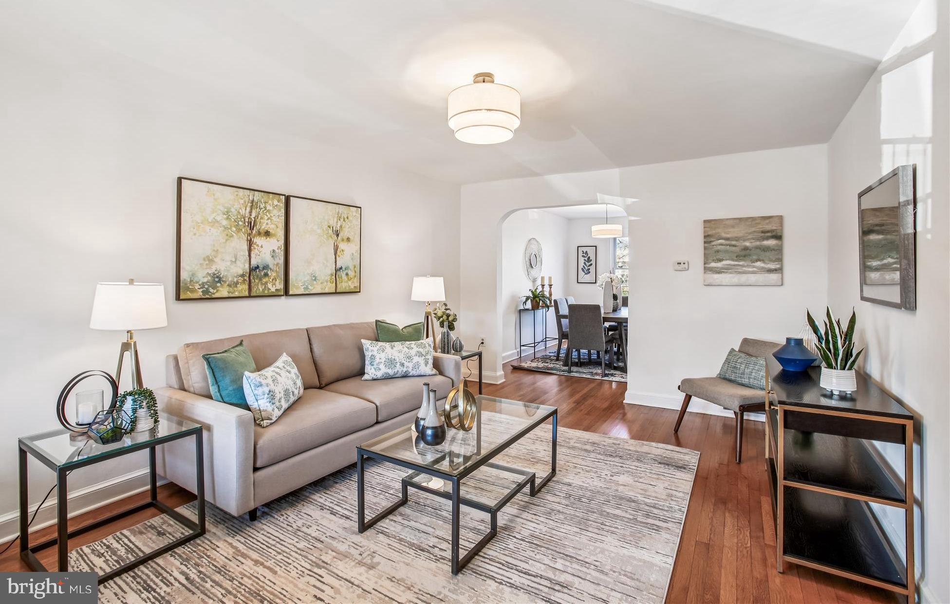 1760 E Street Northeast Washington, DC 20002 - Photo 6 of 46 a living room with furniture and wooden floor