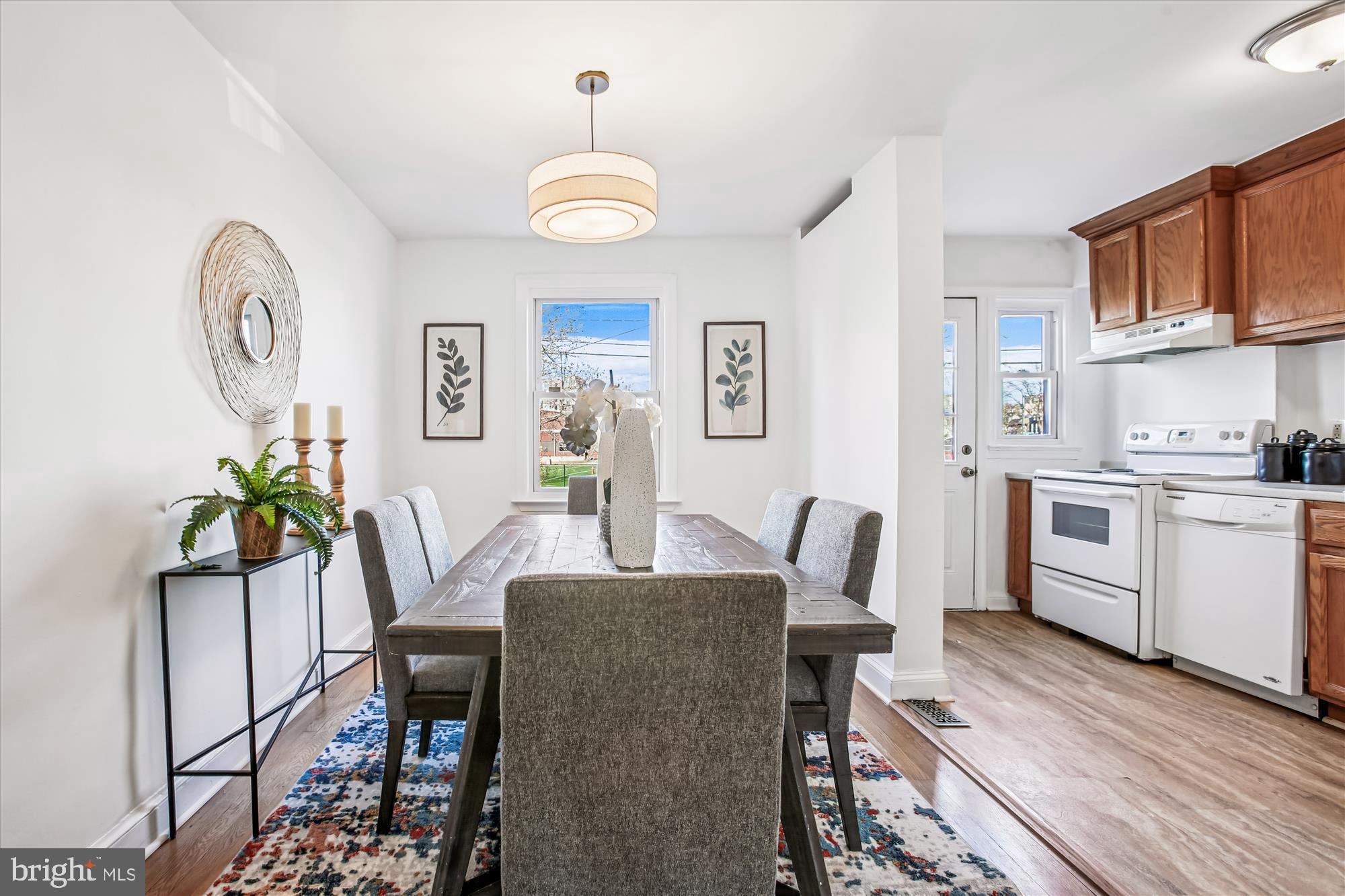 1760 E Street Northeast Washington, DC 20002 - Photo 8 of 46 a view of a dining room with furniture and wooden floor