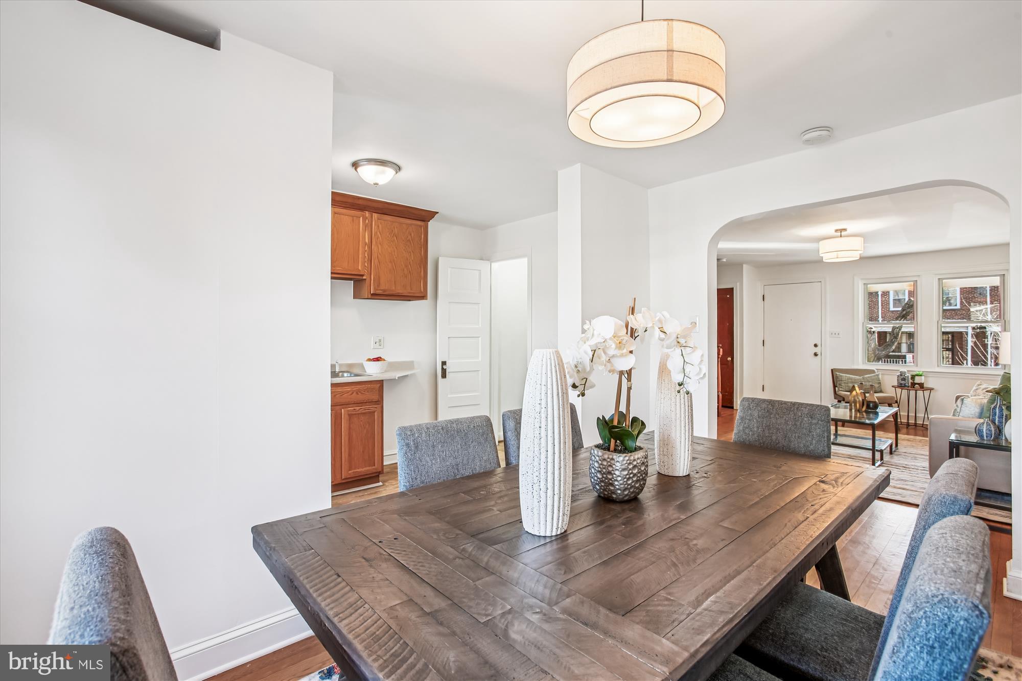 1760 E Street Northeast Washington, DC 20002 - Photo 9 of 46 a view of a dining room with furniture and wooden floor