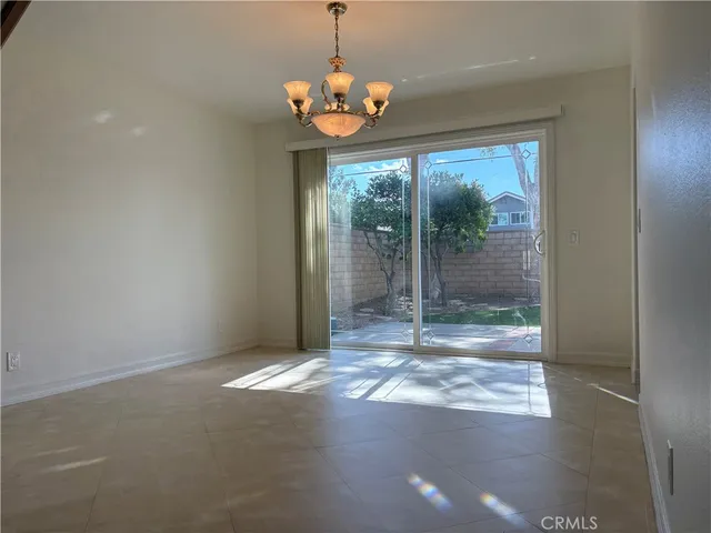 a view of a room with a hallway