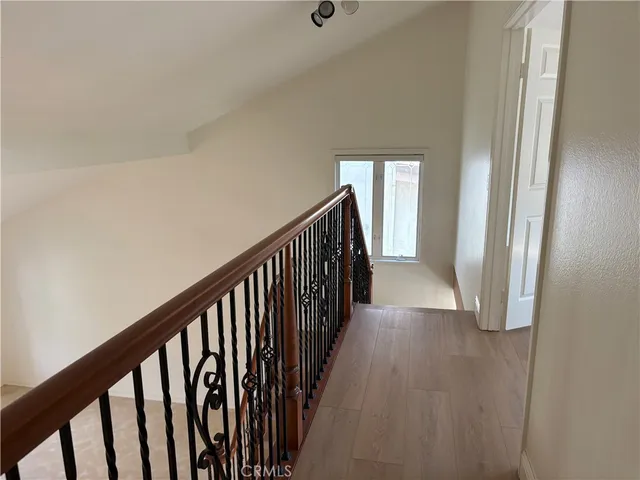 a bathroom with a granite countertop sink a toilet and bathtub
