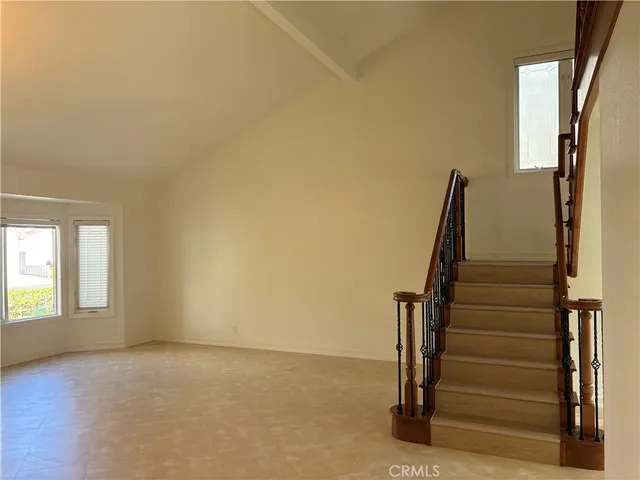 a bathroom with a shower a toilet and sink