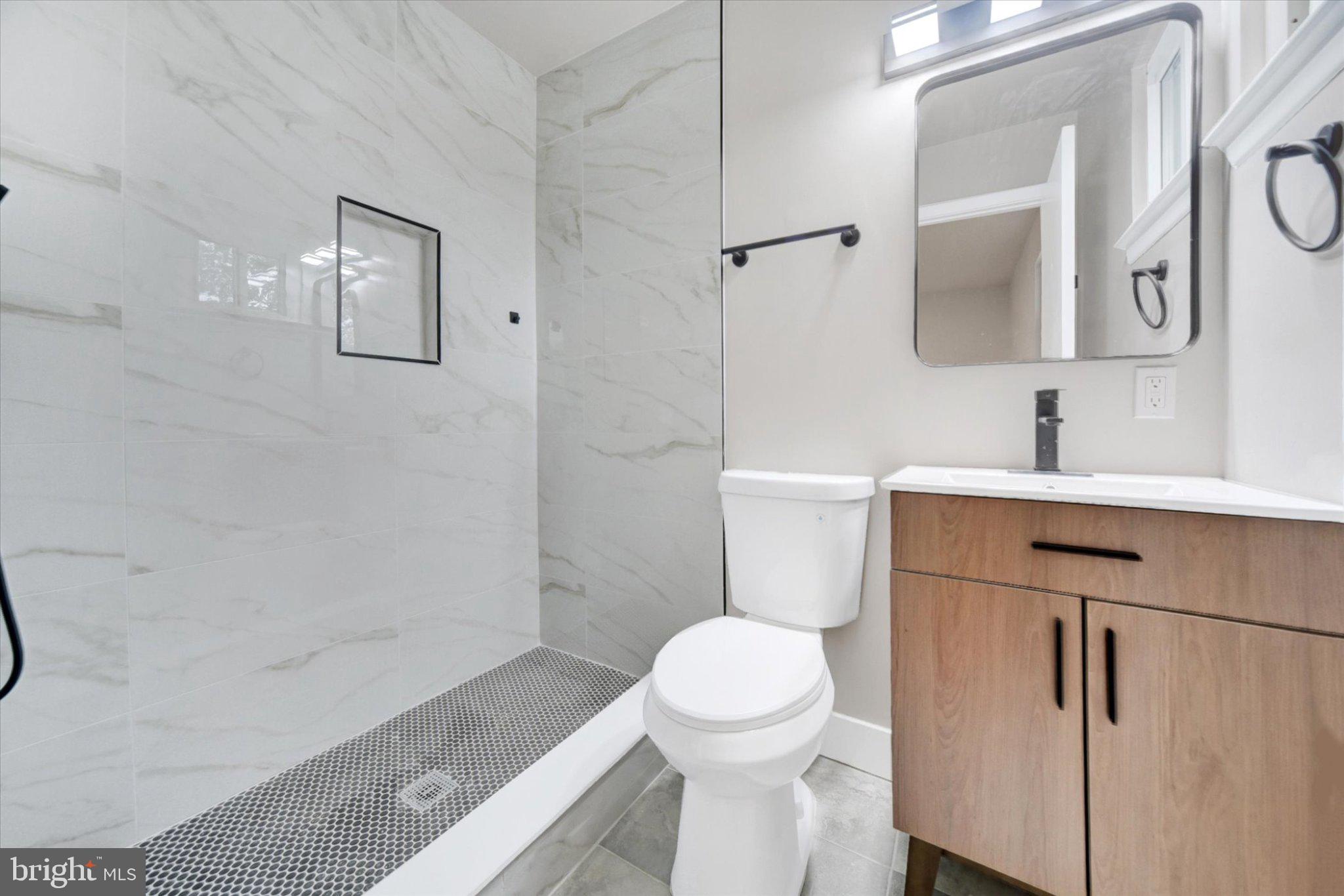 3709 Lamoine Road Randallstown, MD 21133 - Photo 15 of 25 Sleek modern bathroom retreat.