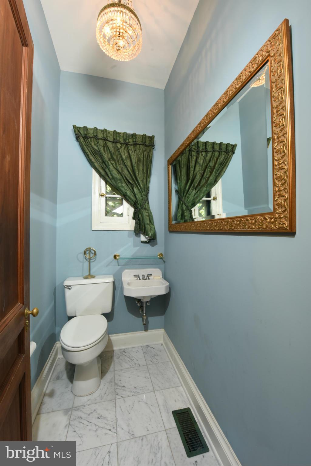 205 Wendover Road Baltimore, MD 21218 - Photo 7 of 30 Powder Room with Marble Flooring