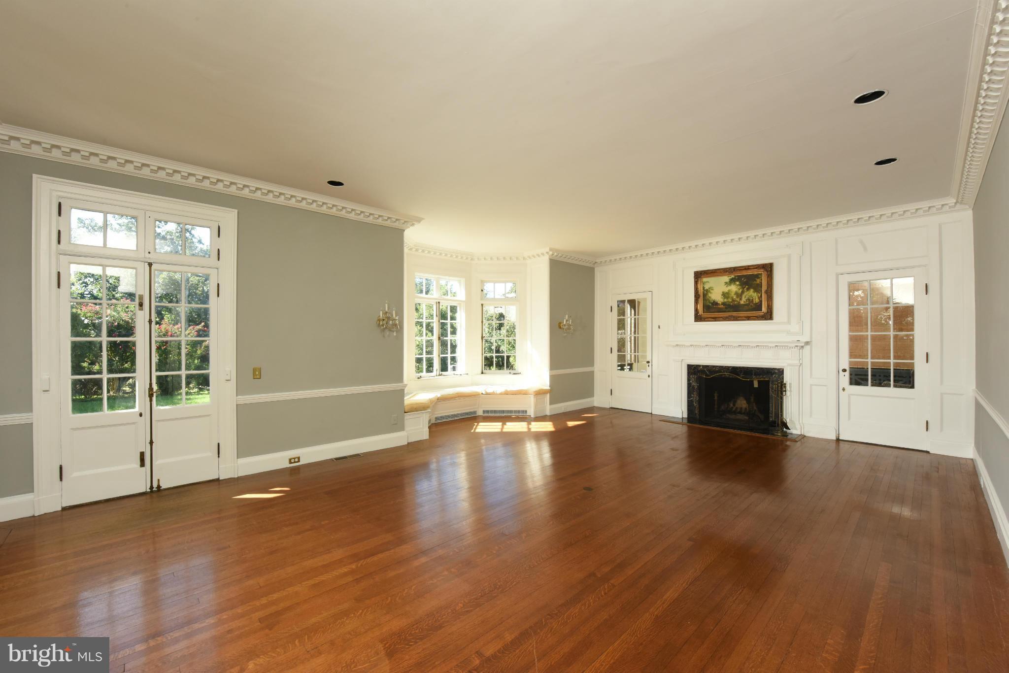 205 Wendover Road Baltimore, MD 21218 - Photo 8 of 30 Light-filled LR easily joins with the outdoors.