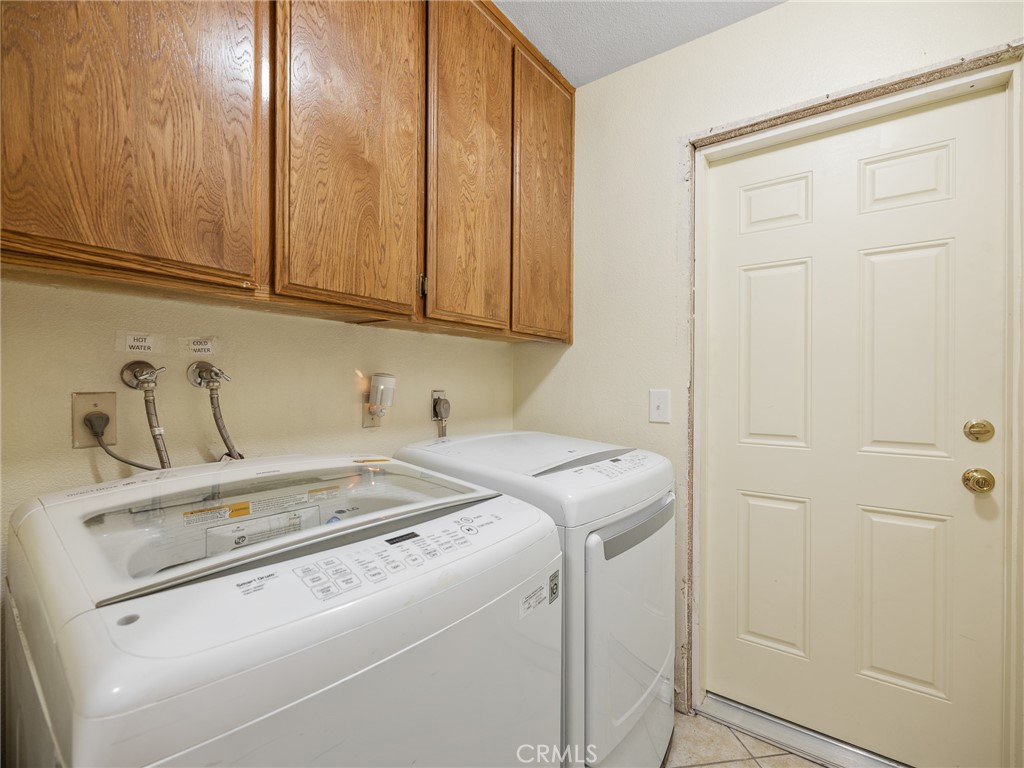 18668 Kamana Road Apple Valley, CA 92307 - Photo 27 of 35 Laundry room leads to garage
