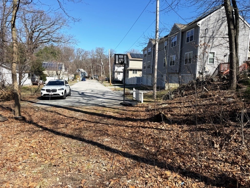 13 Pocasset Street Worcester, MA 01604 - Photo 4 of 12 a view of a building with sitting area
