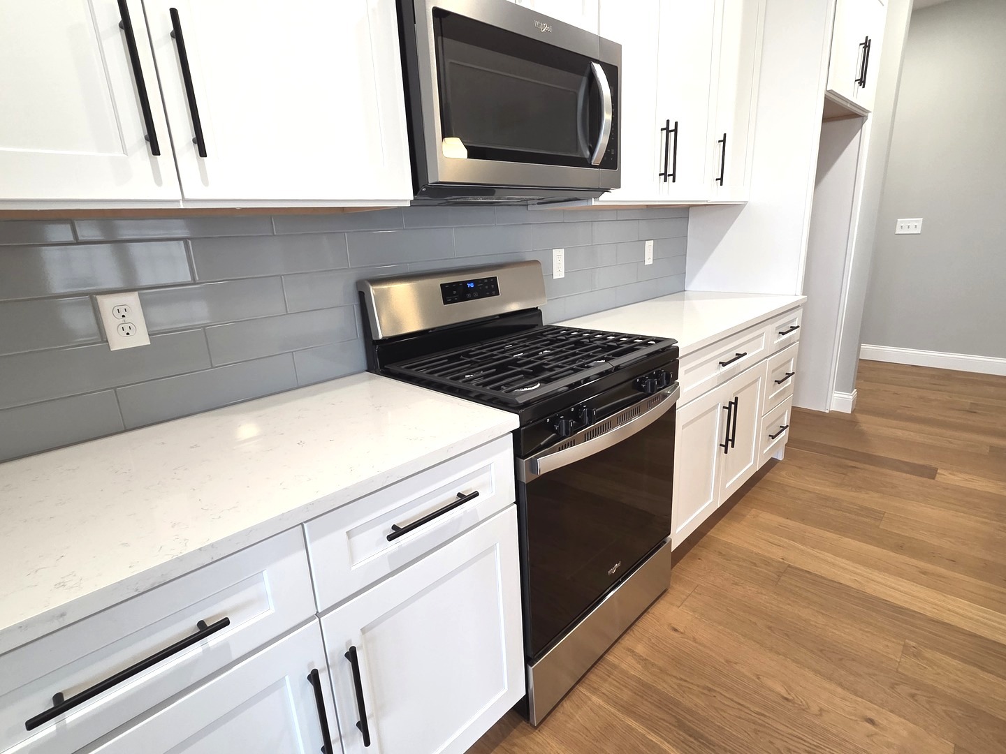 3 Saint Ivans Circle Bloomington, IL 61705 - Photo 21 of 29 a kitchen with stainless steel appliances a sink dishwasher stove and microwave