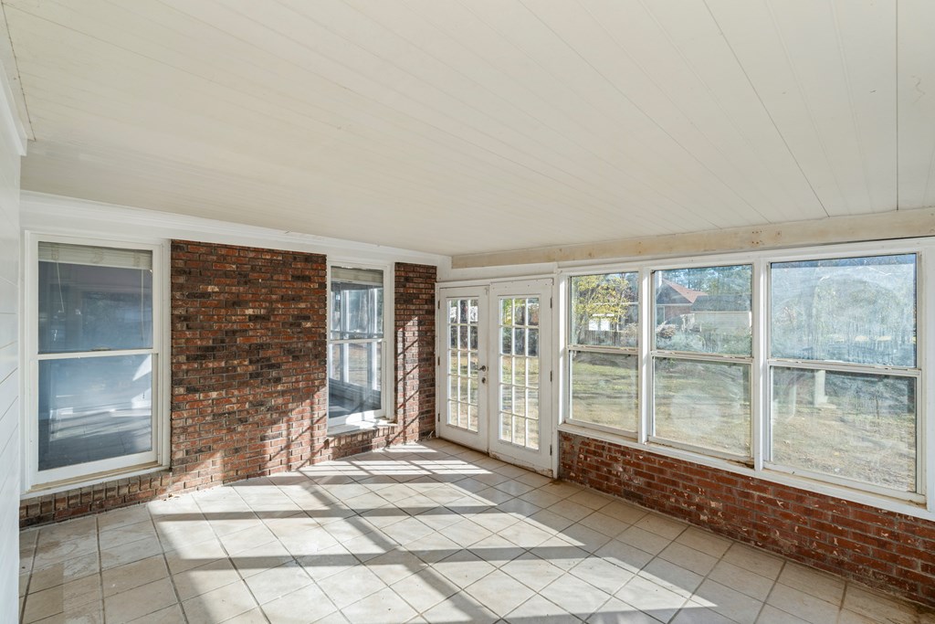 4824 Spring Ridge Court Columbus, GA 31909 - Photo 22 of 28 a living room with a large window