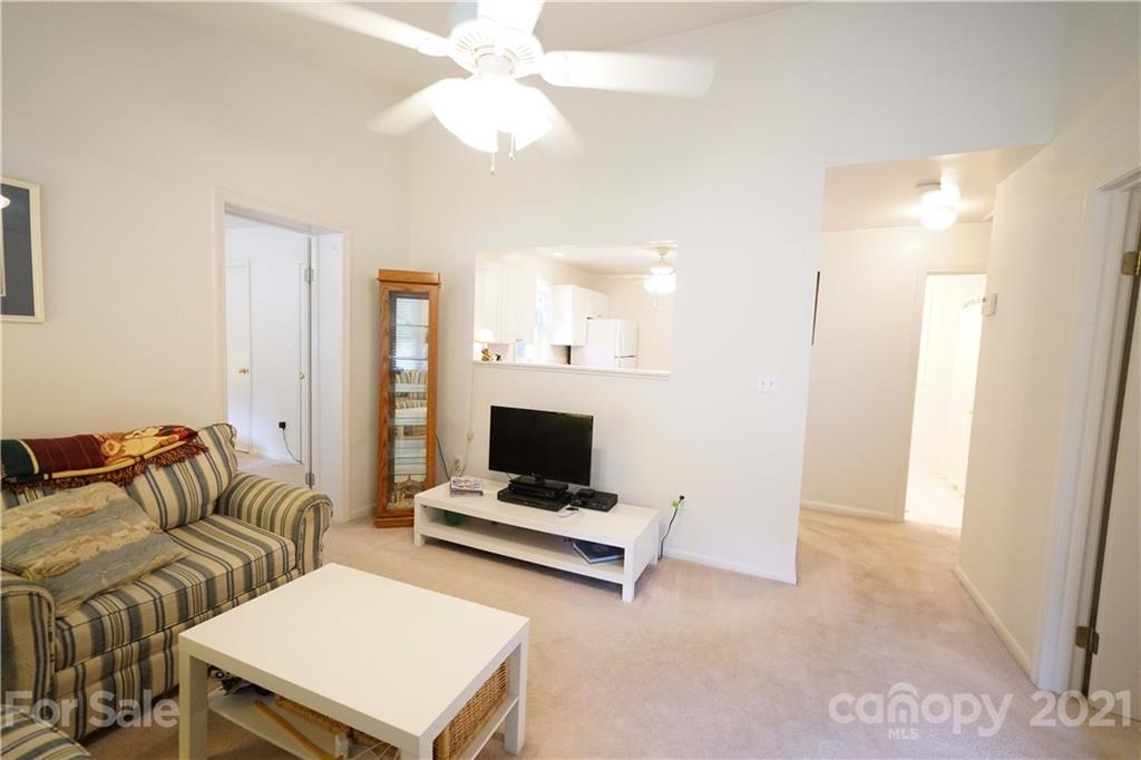 2975 Sharon Road York, SC 29745 - Photo 4 of 18 a living room with furniture and a chandelier