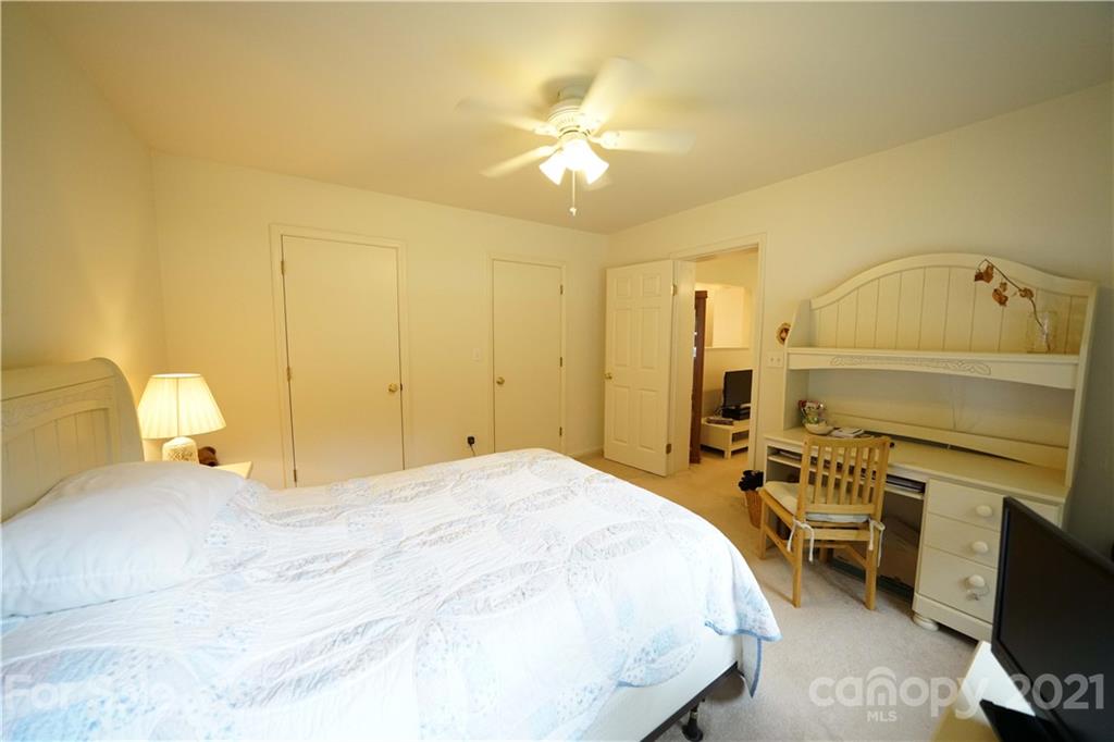 2975 Sharon Road York, SC 29745 - Photo 9 of 18 a bedroom with a bed and a chandelier