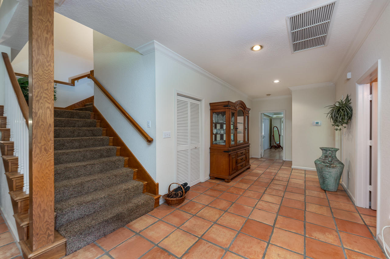 12852 175th Road North Jupiter, FL 33478 - Photo 11 of 45 Staircase to guest rooms