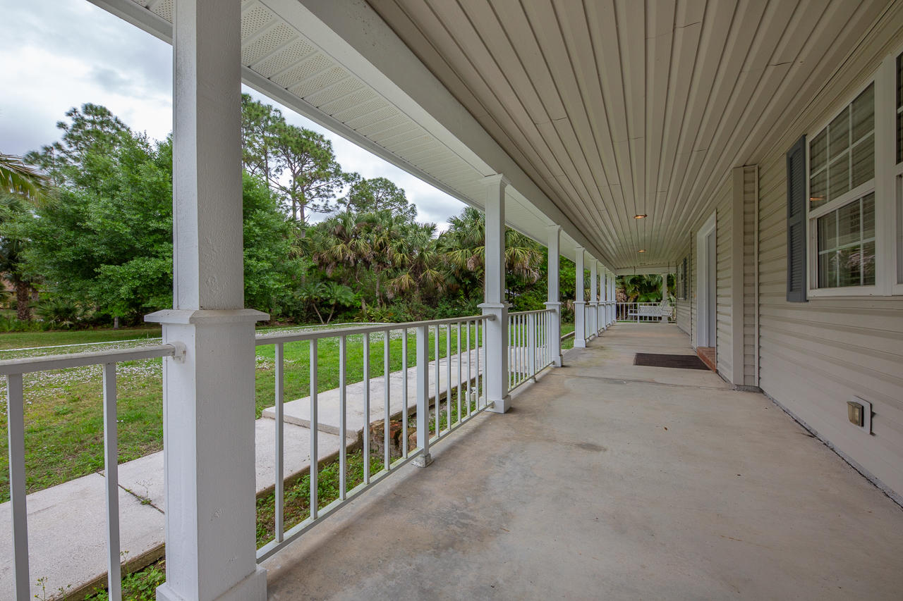 12852 175th Road North Jupiter, FL 33478 - Photo 7 of 45 Wrap around porch