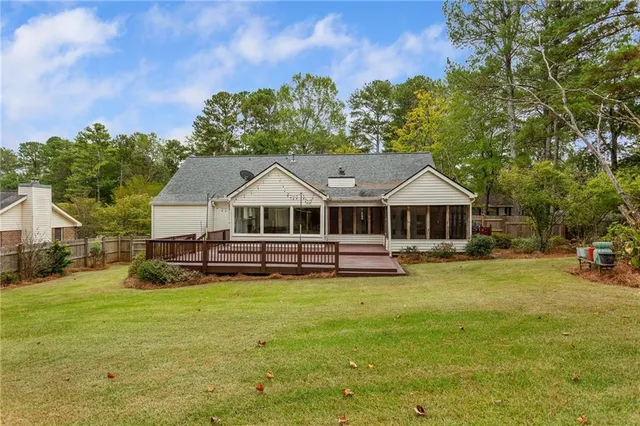 a front view of a house with yard porch and green space